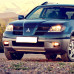 Купить Бампер передний в цвет кузова Mitsubishi Outlander 1 (2002-2006) в Казани